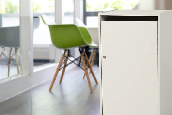 Secure shredding console with locking cabinet for confidential document disposal, secure document destruction, and compliance-focused paper shredding.